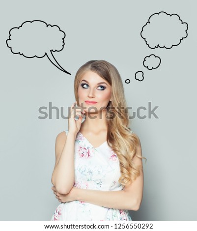 Young woman with empty speech cloud bubble