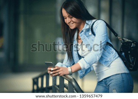 Similar – beautiful woman talking on the phone while laughing.