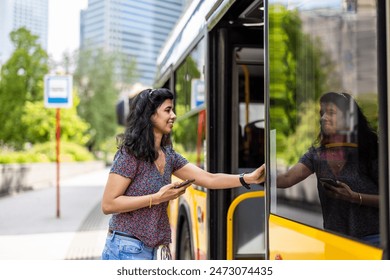 Young woman entering a city bus - Powered by Shutterstock