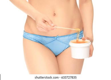 Young Woman With Epilated Bikini Zone Holding Can Of Wax On White Background