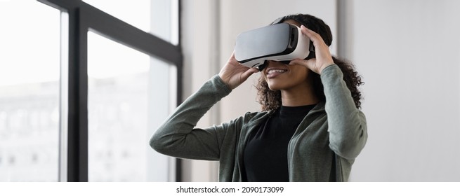 Young Woman Experiencing Virtual Reality Headset At Home. VR, Future, Gadgets, Technology, Education Online, Studying, Video Game, Virtual Event Concept