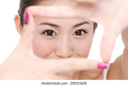 Young Woman Face And Eye Care And She Making Frame With Hands, Asian Beauty