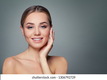 Young Woman Face. Healthy Skin, Cute Smile. Perfect Girl Smiling. Facial Treatment, Skincare And Cosmetology Concept