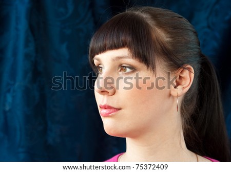 Similar – Hopeful Portrait of a Young Woman at the Window