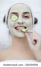 A Young Woman With A Face Pack.