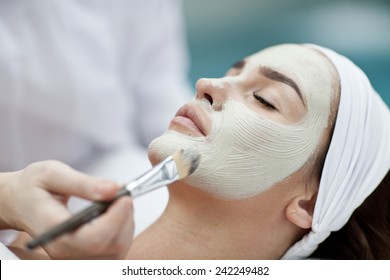 A Young Woman With A Face Pack. 