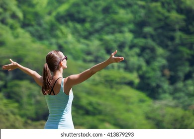 Young Woman Feeling Free Enjoying The Great Outdoors. 