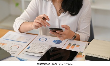 Young Woman Financial Advisor Using Chatting Online With Her Client On Her Mobile Phone