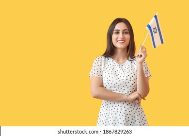 Young Woman With The Flag Of Israel On Color Background