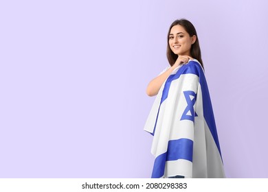 Young Woman With The Flag Of Israel On Color Background