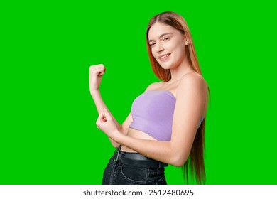 Young Woman Flexing Bicep Against Green Screen - Powered by Shutterstock