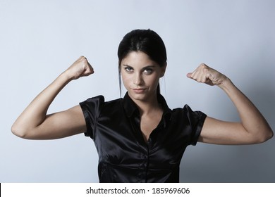 Young Woman Flexing Muscles