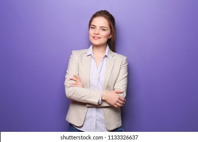 Young Woman In Formal Clothes On Color Background