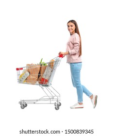 Young Woman With Full Shopping Cart On White Background