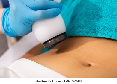 Young Woman Getting Abdomen Fat Reductive Rf Lifting Body Treatment On Professional Equipment, Close Up View