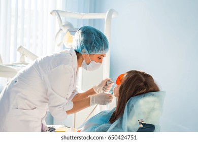 Young woman getting dental treatment. dental clinic.