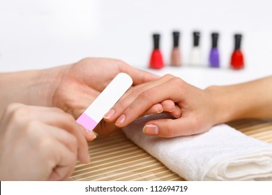 Young Woman Is Getting Manicure In A Beauty Salon