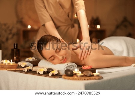 Similar – Image, Stock Photo a woman lies on a green sofa. resting.