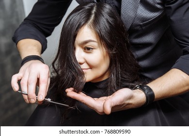 Young Woman Getting A New Haircut At Hairdressing Salon.