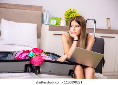 Young woman getting ready for summer vacation - Powered by Shutterstock