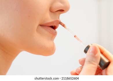 Young Woman Getting Ready For Work Doing Morning Makeup Routine