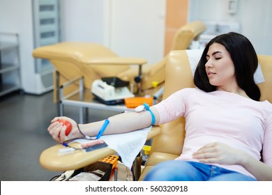 Young Woman Giving Her Blood In Hemotransfusion Center