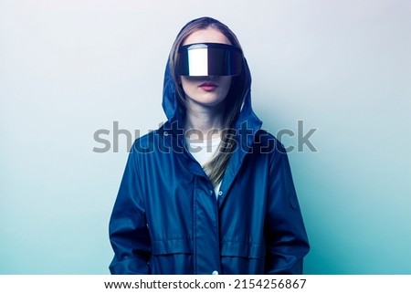 Similar – Mysterious young woman covering by a hood