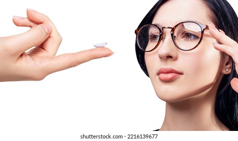 Young Woman In Glasses Decides To Wear Contact Lenses. Isolated On White. Glasses Of Lenses Concept.