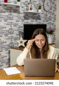 Young Woman Going Crazy With A Computer In Her Home