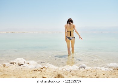 Young Woman Going To Dead Sea, Israel