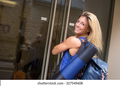 young woman going to the gym