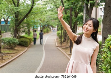 Young Woman Going On A Date Outdoors