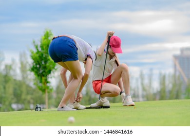 Young Woman Golf Player Feel Uncomfortable In Wear Of Shoe, Change Or Replace Active Shoe In The Golf Course, Dissatisfied Golf Shoe During Playing In Golf Course, Wrong Size Wearing Shoe