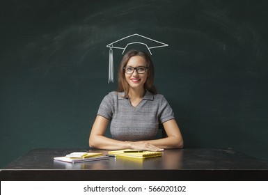 Young woman with graduation hat - Powered by Shutterstock