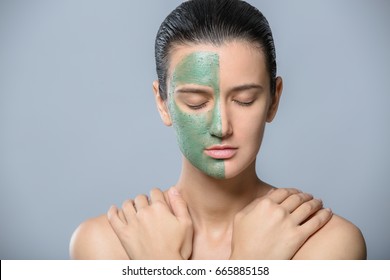 Young Woman With Green Face Mask - Studio Portrait