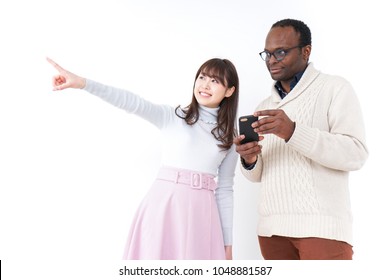 Young woman guiding traveler