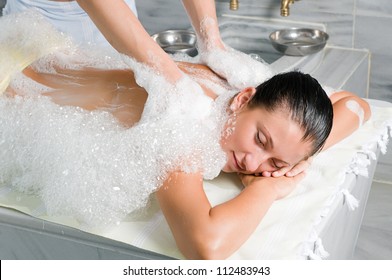 Young Woman In Hammam Or Turkish Bath