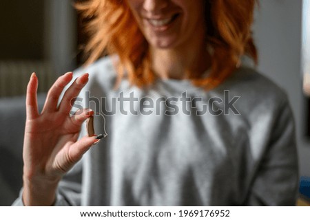 Image, Stock Photo Hand holding an acoustic guitar with black background with a dramatic and cinematic tone in chiaroscuro