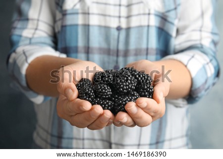 Similar – Blackberries in a child hand