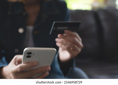 Young Woman Hands Holding Credit Card, Using Smart Mobile Phone For Digital Banking, Internet Payment, Online Shopping Via Mobile Banking App, Financial Technology, E-commerce Concept, Close Up