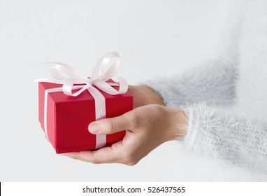 Young Woman Hands Holding Red Gift Box 