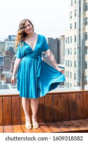 Young Woman Happy Girl Standing On Rooftop Restaurant In New York City NYC At Wedding Reception With Cityscape Skyscrapers View