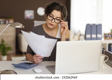 Young Woman Hard Working At Home 