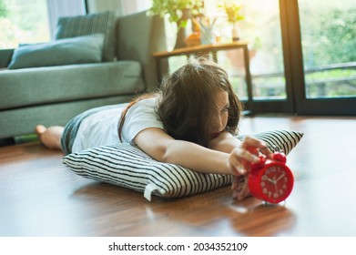 A Young Woman Has A Hangover From Last Night's Binge Drinking. The Girl Just Woke Up From A Nap At Home. A Woman Who Is Sick Or Not Getting Enough Rest Is Resting At Home.