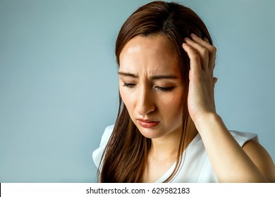 young woman have a headache