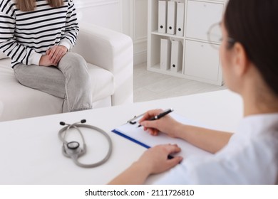 Young Woman Having Appointment With STD Specialist In Clinic, Closeup