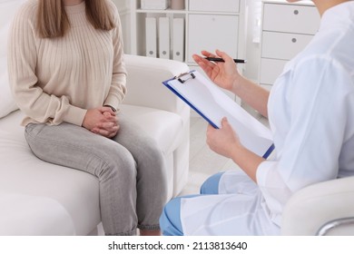 Young Woman Having Appointment With STD Specialist In Clinic, Closeup