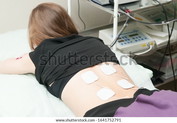 Young Woman Having Electrotherapy Treatment Clinic Stock Photo ...