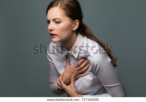 Young woman having heart\
ache.