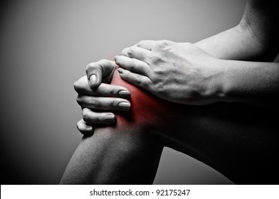 Young Woman Having Knee Pain